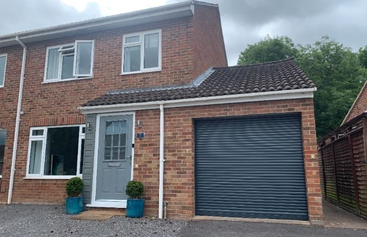 Electric roller garage doors